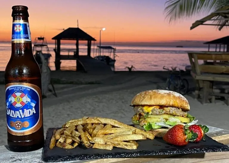 The beachfront at Sea Hunt Divers and the Deco Stop Bar & Grill in West End, Roatán